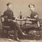 Two soldiers drinking wine